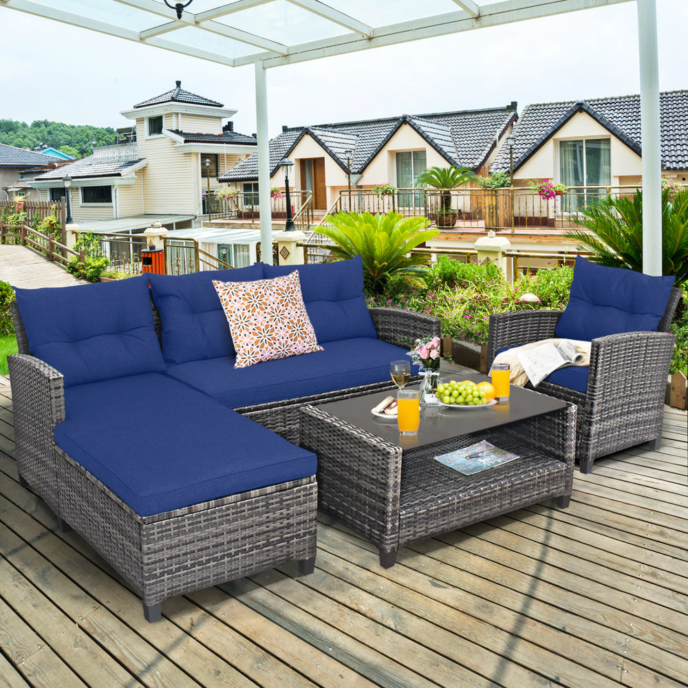 Close-up of the navy cushion on a patio rattan sofa set, showcasing the soft fabric and ergonomic design for outdoor.