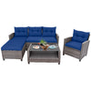 4-piece patio rattan sofa set with navy cushions and tempered glass coffee table, perfect for outdoor relaxation.