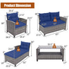 4-piece patio rattan sofa set with navy cushions, featuring a 2-tier coffee table and adjustable feet for stability.