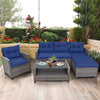 4-piece patio rattan sofa set with navy cushions and a 2-tier coffee table, perfect for outdoor relaxation.