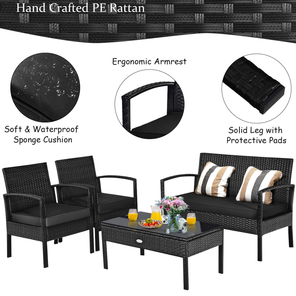 4-piece patio rattan furniture set includes a loveseat, two single sofas, and a coffee table with soft cushions for outdoor comfort.