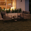 Outdoor PE rattan conversation sofa set with grey cushions, featuring a coffee table, ideal for patio relaxation.