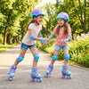 Two kids in purple adjustable roller skates with light-up wheels, enjoying a fun day outdoors in a park.