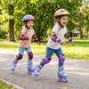 Two kids roller skating in adjustable purple skates with light-up wheels, enjoying outdoor fun and safety.