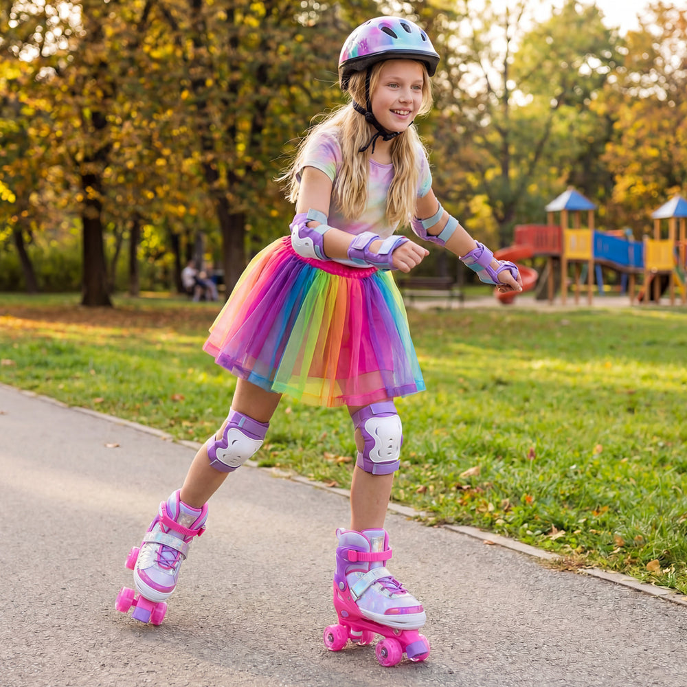 Colorful adjustable kids roller skates in pink with light-up wheels, perfect for outdoor fun and beginner skaters.