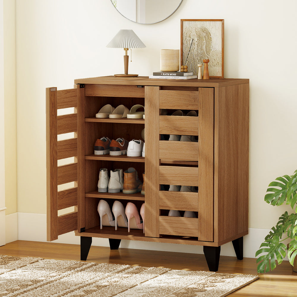 4-tier farmhouse shoe organizer in natural wood with louvered doors, featuring adjustable shelves for shoe storage.