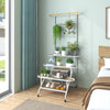 4-tier hanging plant stand with a sturdy metal frame, featuring a hanging bar and 360° swiveling wheels for easy.
