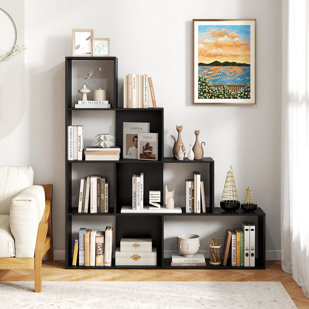 Close-up of the black 4-tier modern bookshelf's edge-sealing and non-slip foot pads, ensuring durability and stability.