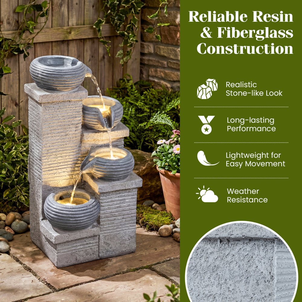 4-tier outdoor water fountain with cascading bowls and LED lights, made of durable resin and fiberglass for lasting.