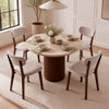 Four upholstered dining chairs with curved backrests and solid rubber wood frames, perfect for dining rooms or cafes.