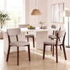 Four upholstered dining chairs with solid rubber wood frames and curved backrests, ideal for kitchens and dining rooms.