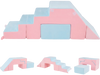 Colorful 4-in-1 foam climbing blocks in pink and blue provide a safe and fun indoor play area for toddlers.