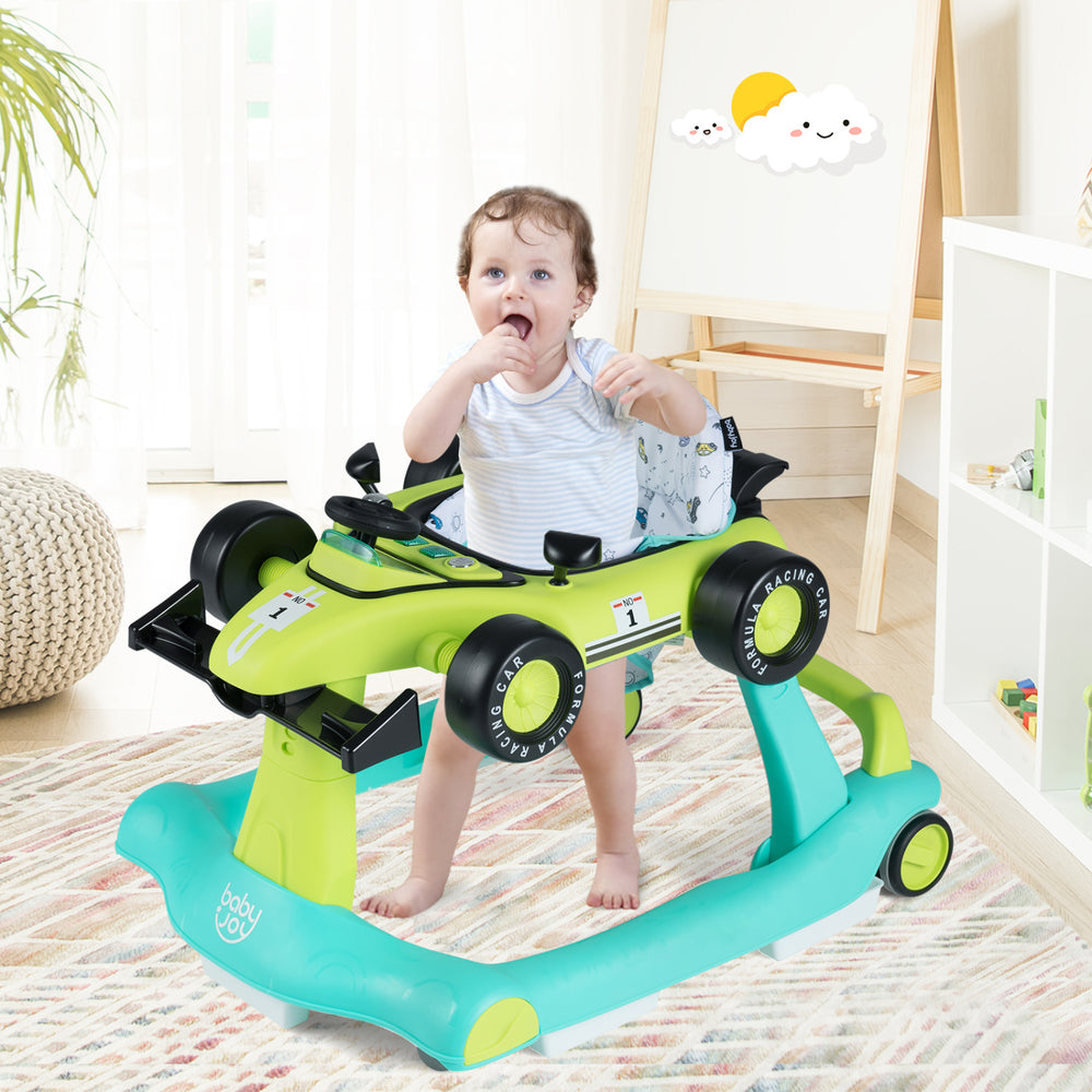 4-in-1 foldable activity push walker in green with adjustable height, featuring a toy steering wheel and safety bumper.