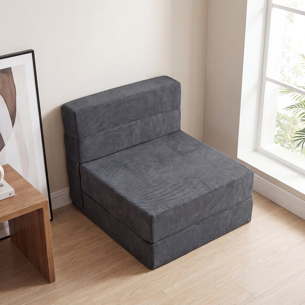 Gray 4-in-1 folding sofa bed with corduroy cover, shown in a corner setting for versatile living room use.