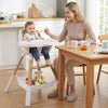High chair for babies with adjustable tray, sturdy wooden legs, and a storage basket, ideal for mealtime convenience.