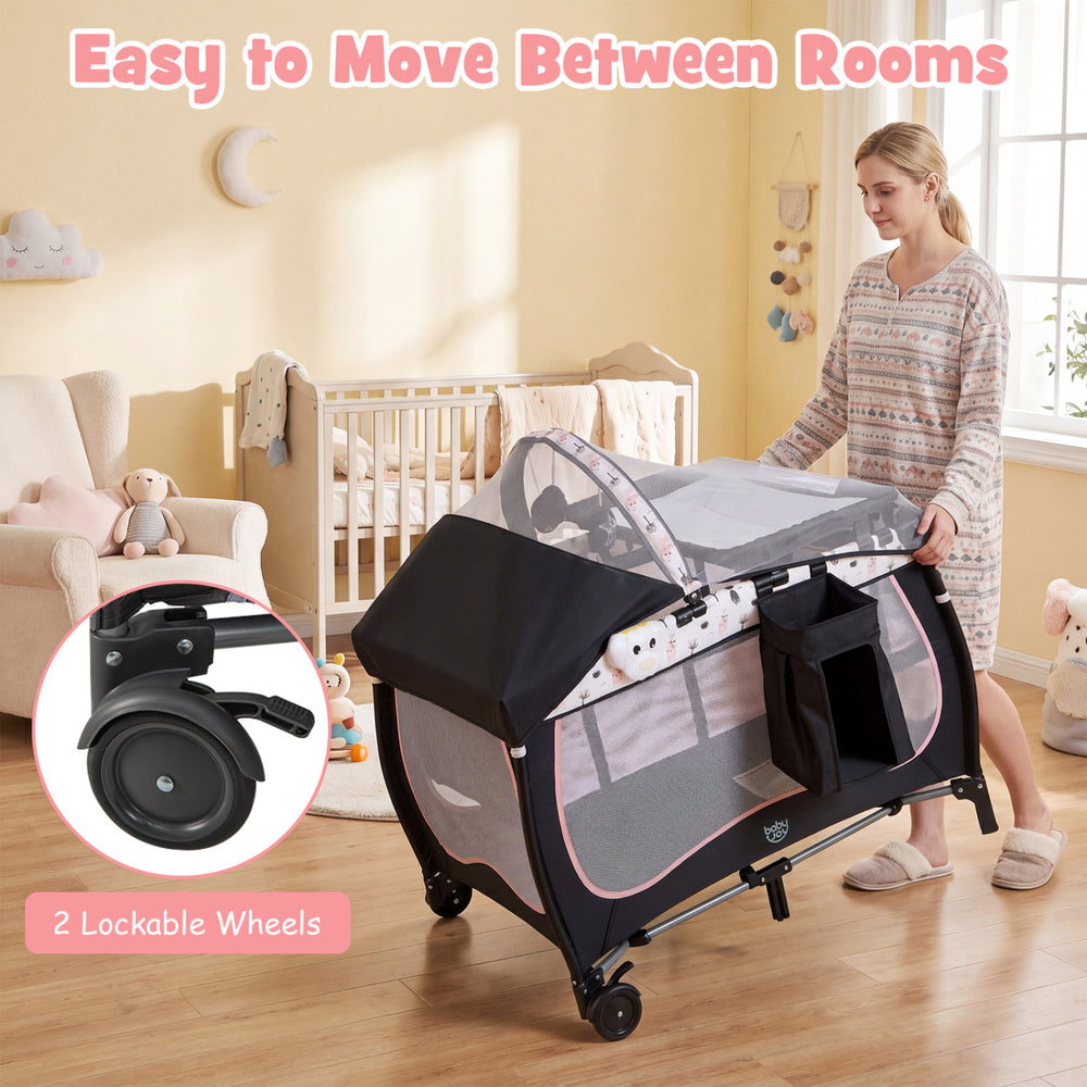 4 in 1 Portable Baby Nursery Center with Net and Music Box-Pink - Gallery View 1 of 9