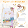 Toddler using the 4-in-1 activity table set with a replaceable paper roll for creative drawing and art activities.