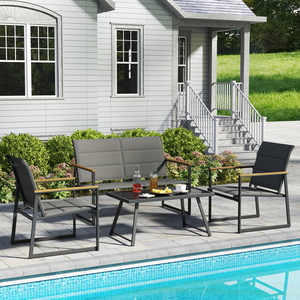 4-piece outdoor conversation patio furniture set in gray featuring a loveseat, two armchairs, and a coffee table by the.