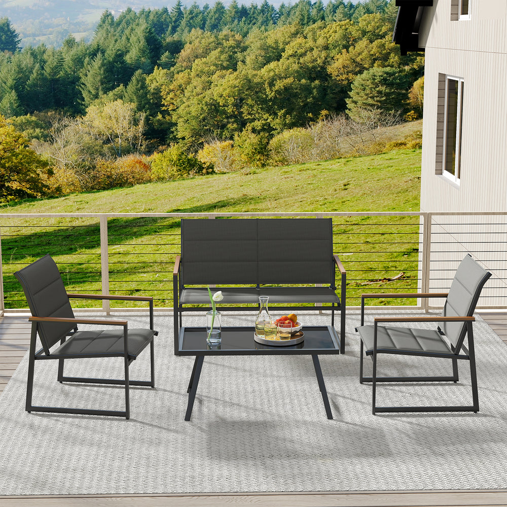 4-piece gray outdoor conversation set featuring a loveseat, two armchairs, and a coffee table on a patio.