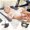 Portable changing table with safety belt, flip away design, and side storage rack for convenient baby care.