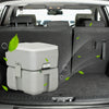 Portable 5.3-gallon travel toilet with piston pump flush, designed for camping and outdoor activities, shown in a car.