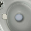 Close-up view of the 5.3-gallon portable travel toilet bowl, designed for outdoor activities and easy flushing.