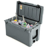 50 QT gray rotomolded cooler with integrated cup holders, filled with ice and beverages, ideal for camping and outdoor.