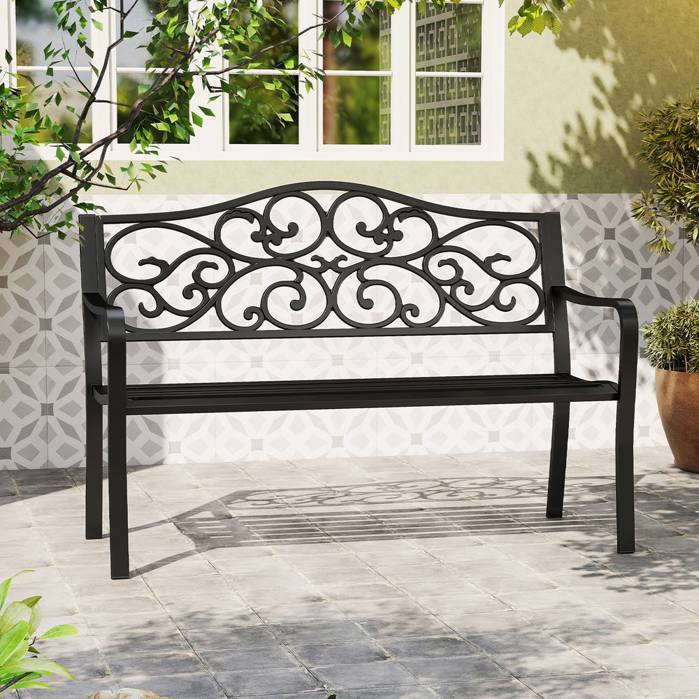 Elegant black outdoor cast iron patio bench featuring a floral design backrest and slatted seat, perfect for cozy.