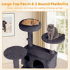 Dark gray 52-inch tall cat tree tower featuring a padded top perch and two round platforms for lounging and climbing.
