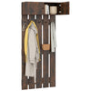 Rustic brown wall-mounted coat rack featuring sturdy metal hooks and a compact design, perfect for maximizing wall.