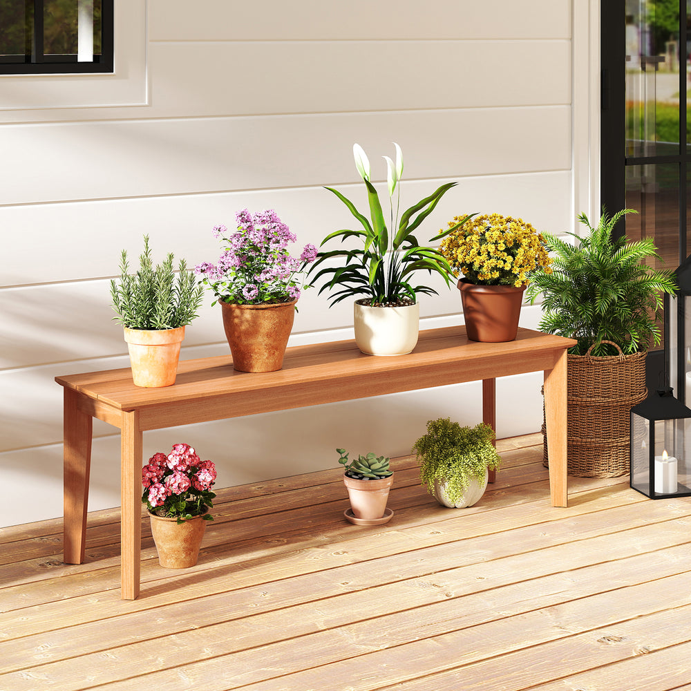 Teak wood outdoor bench with plants on top, featuring a solid construction and 880 lbs weight capacity for patio use.