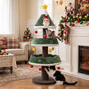 Multi-level 56.5-inch cat tower in festive green features a Christmas tree design, perfect for climbing and cozy naps.