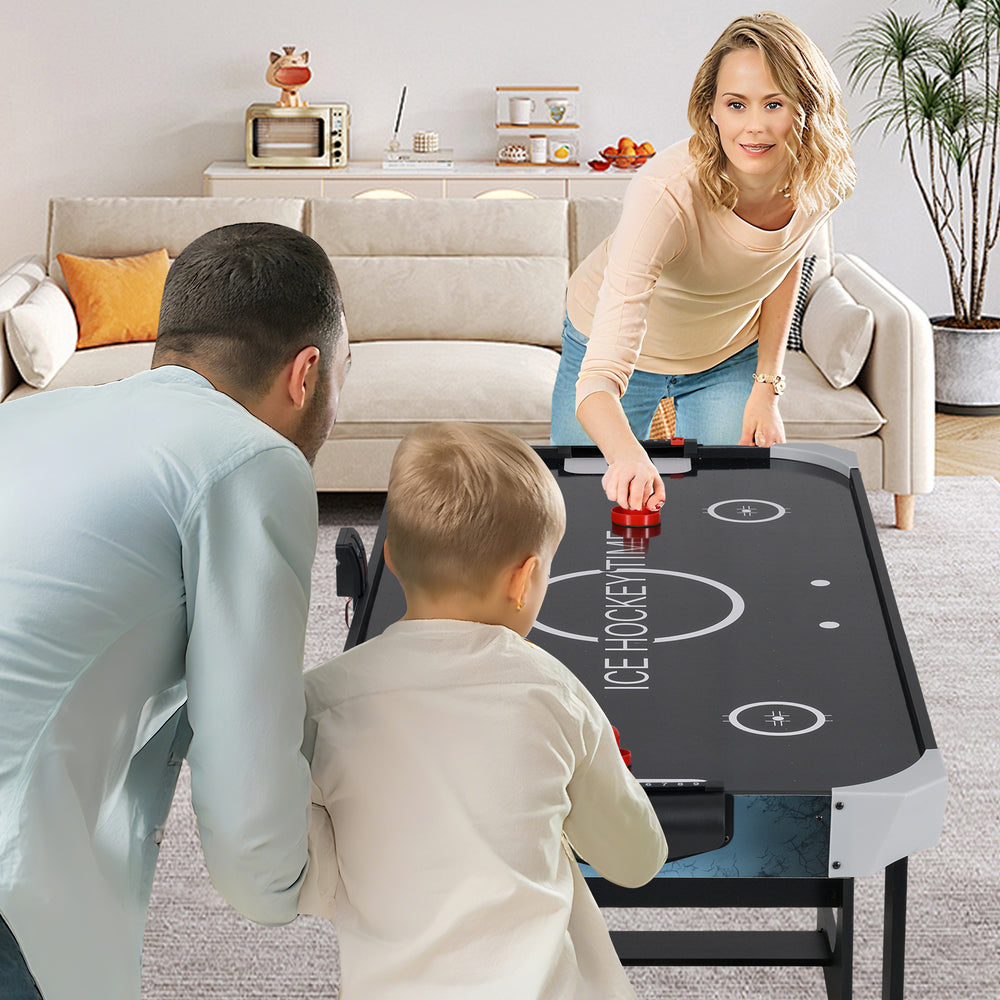 56-inch air hockey table with LED scoreboard, featuring a powerful motor, ideal for small spaces and family fun.