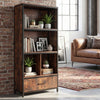 Rustic brown 56" tall freestanding bookcase with drawer, featuring open compartments and a sturdy metal frame for home.