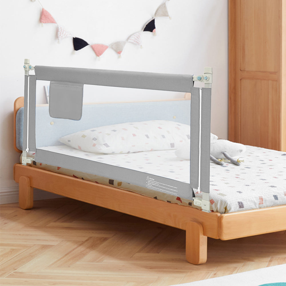 Gray 57-inch toddler bed rail guard with adjustable height, vertical lifting design, and storage pocket for safety.