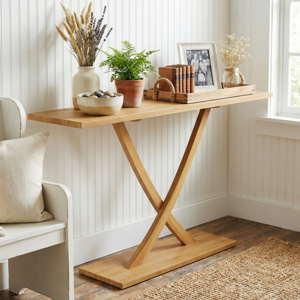 Solid wood console table with teak frame and geometric design, featuring a spacious 57" tabletop for versatile use.