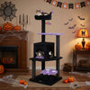 Multi-level 57" spooky cat tower in purple with removable perch, cozy condo, and spider-shaped toy for playful cats.