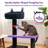 Spooky spider-shaped dangling toy on a 57" cat tower with plush fabric, perfect for playful cats and secure lounging.