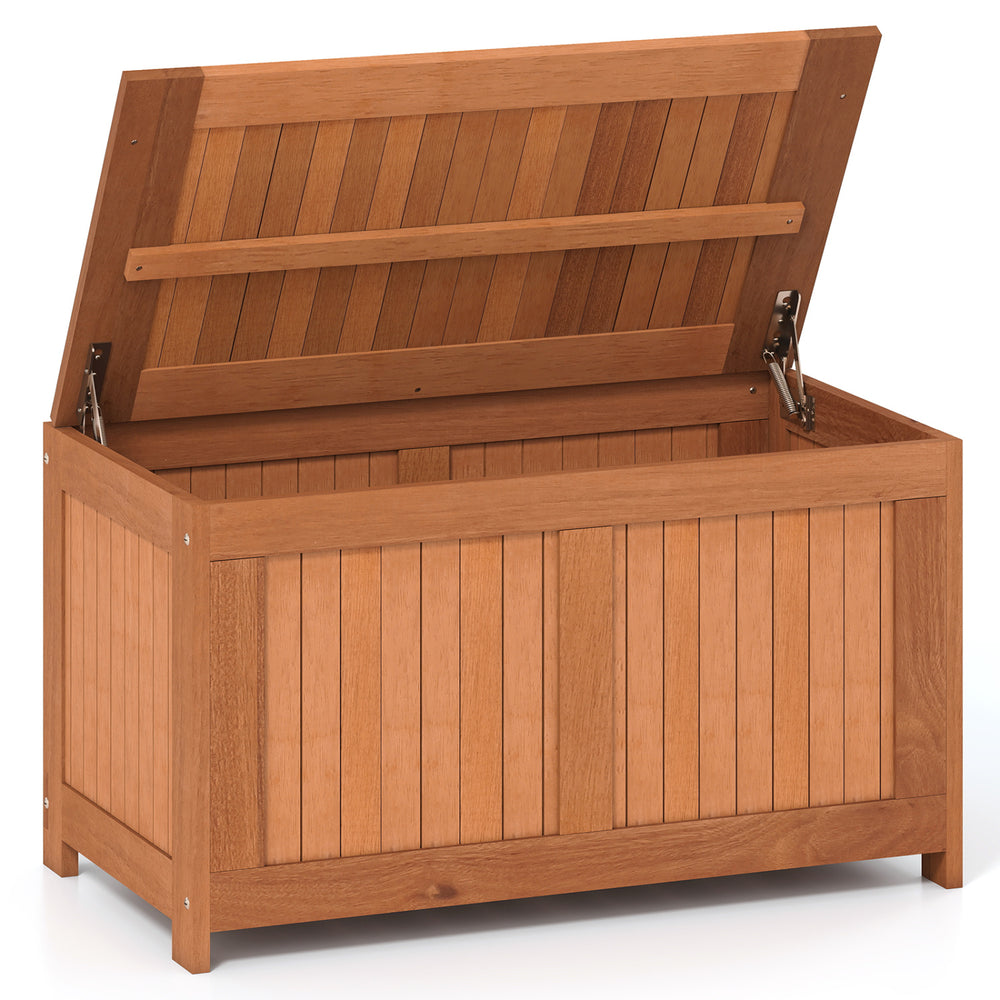 Wood deck box with flip top, 52-gallon capacity, ideal for outdoor storage and seating in patio or garden settings.