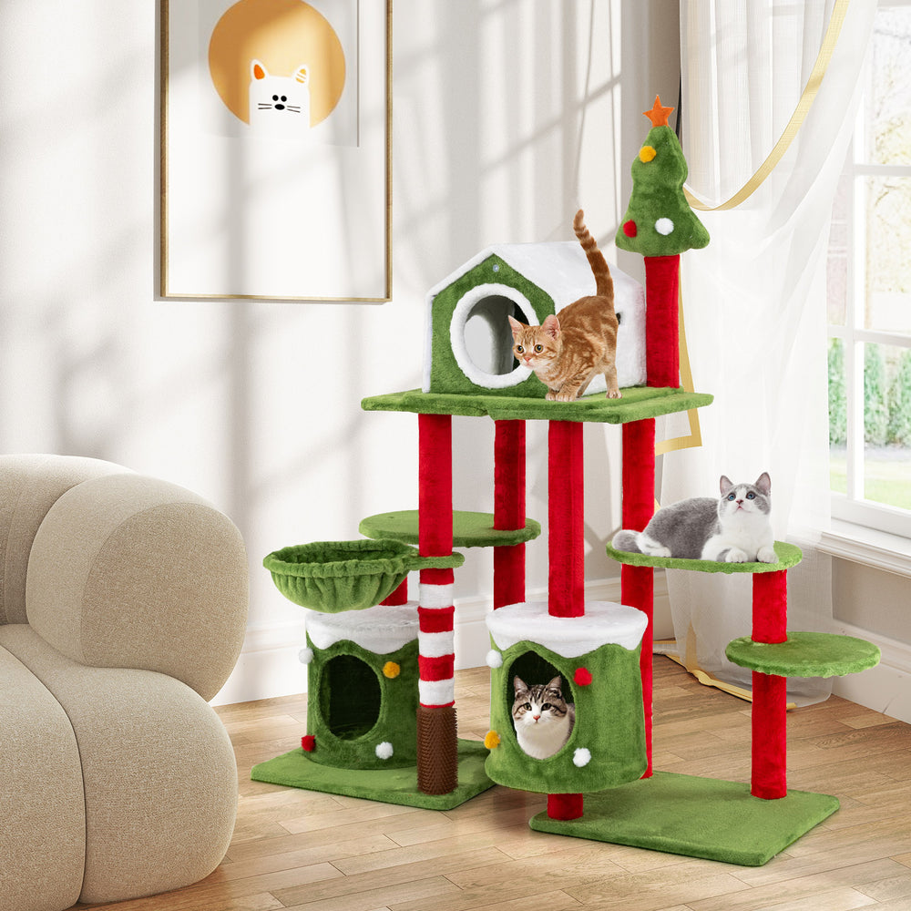 Multi-level 58-inch tall cat tree with condos, festive design, and cozy relaxation spots for holiday-themed fun.