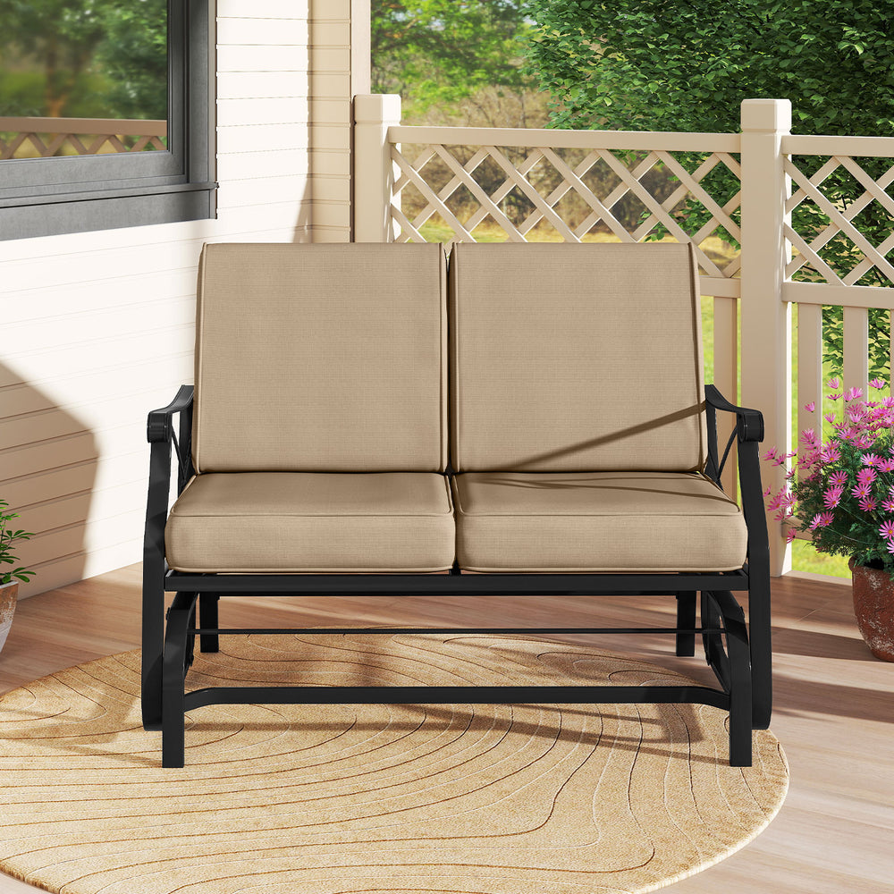 Outdoor 2-person glider rocking loveseat with thick cushions and metal frame, perfect for patio relaxation.
