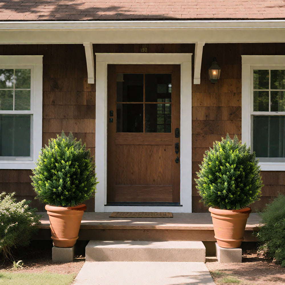 24-inch artificial cypress topiary ball tree set in terracotta pots, perfect for indoor and outdoor decoration.