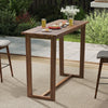 Outdoor bar table with slatted top, made of premium teak wood, perfect for patio gatherings and bar chairs 28"-32" high.