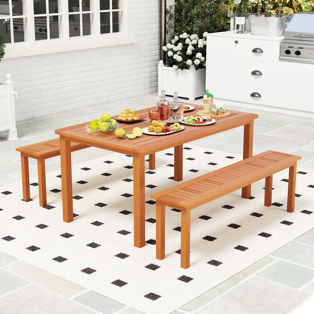 Backless wooden bench with teak oil finish, slatted design for ventilation, ideal for outdoor patios and dining.