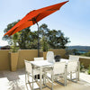 9 ft orange patio umbrella with crank, featuring a sturdy steel pole, providing shade for outdoor dining areas.