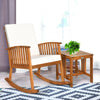 Acacia wood rocking chair and table set with thick cushions, perfect for indoor or outdoor relaxation.