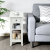 White 3-tier nightstand with drawer and open shelves, ideal for bedside or living room storage and easy access.
