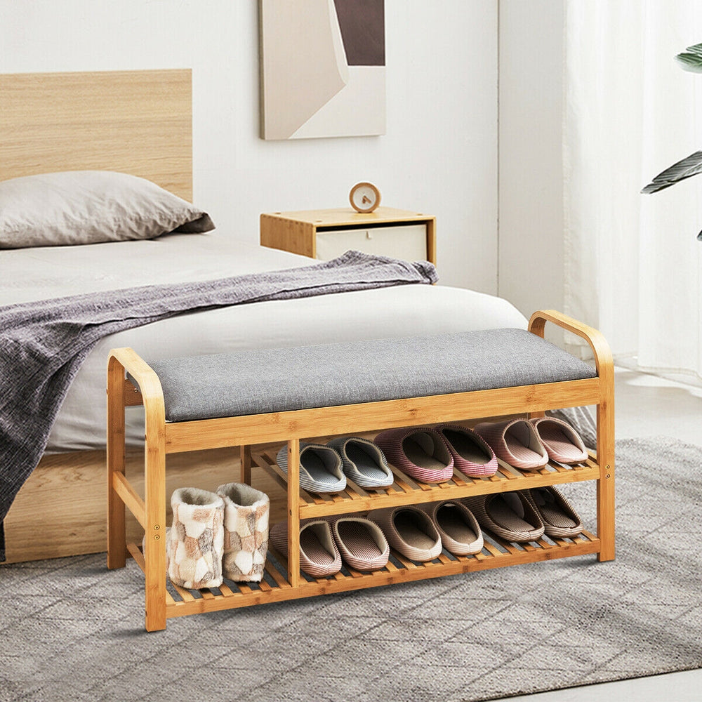 Bamboo shoe rack bench with cushion, featuring three tiers for storage, ergonomic height, and modern design for bedroom.