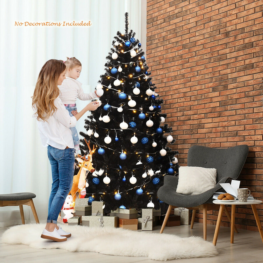 Black 6 feet hinged artificial Christmas tree with 1036 branch tips, ideal for customizable holiday decor at home.