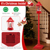5.3 feet red musical Christmas street lamp with swirling snow and 60 LED lights, perfect for festive holiday decor.